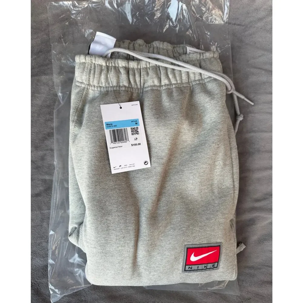 Nike Solo Swoosh Open-Hem Fleece Pants Grey Men’s M IO0675-063 NWT